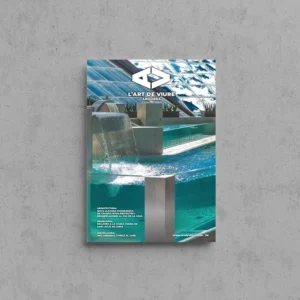 Portada de L'Art de Viure Andorra núm. 127 amb la nova llacuna panoràmica de Caldea, d'aigües turqueses amb una cascada i una coberta de vidre inclinada, amb el logotip de la revista.