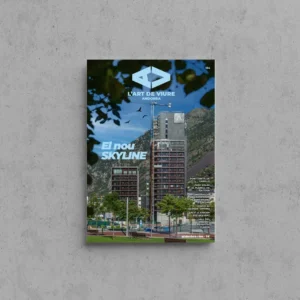 Portada de L'Art de Viure Andorra núm. 134 amb una torre d'habitatges en construcció, amb la grua i la muntanya al fons, emmarcada per fulles en primer terme, sota el títol El nou skyline.