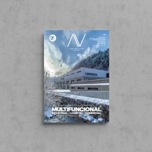 Portada de L'Art de Viure Andorra núm. 141 amb les naus industrials Grillaire Sud de la Massana, un edifici llarg amb el rètol «Commencal», en un paisatge nevat sota un cel amb ocells, sota el títol Multifuncional · Industrial · Logístic · Comercial.