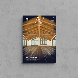 Portada de L'Art de Viure Andorra núm. 143 amb l'interior d'una nau de coberta de fusta a dues aigües amb bigues vistes i finestrals, a les Comellot Mountain Residences de Soldeu, sota el títol Integrat a l'entorn.